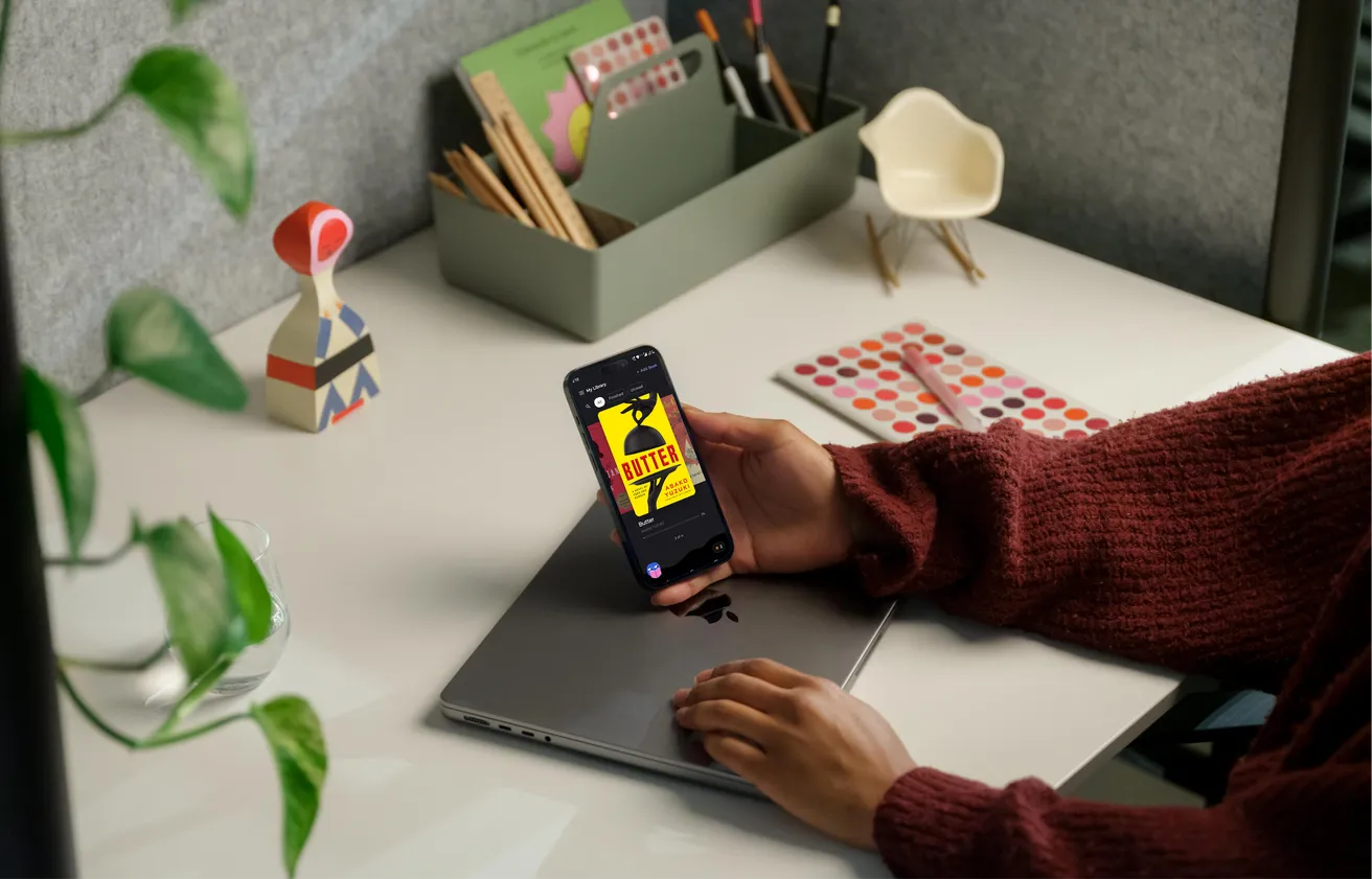 BookSkim app open on a phone at a desk